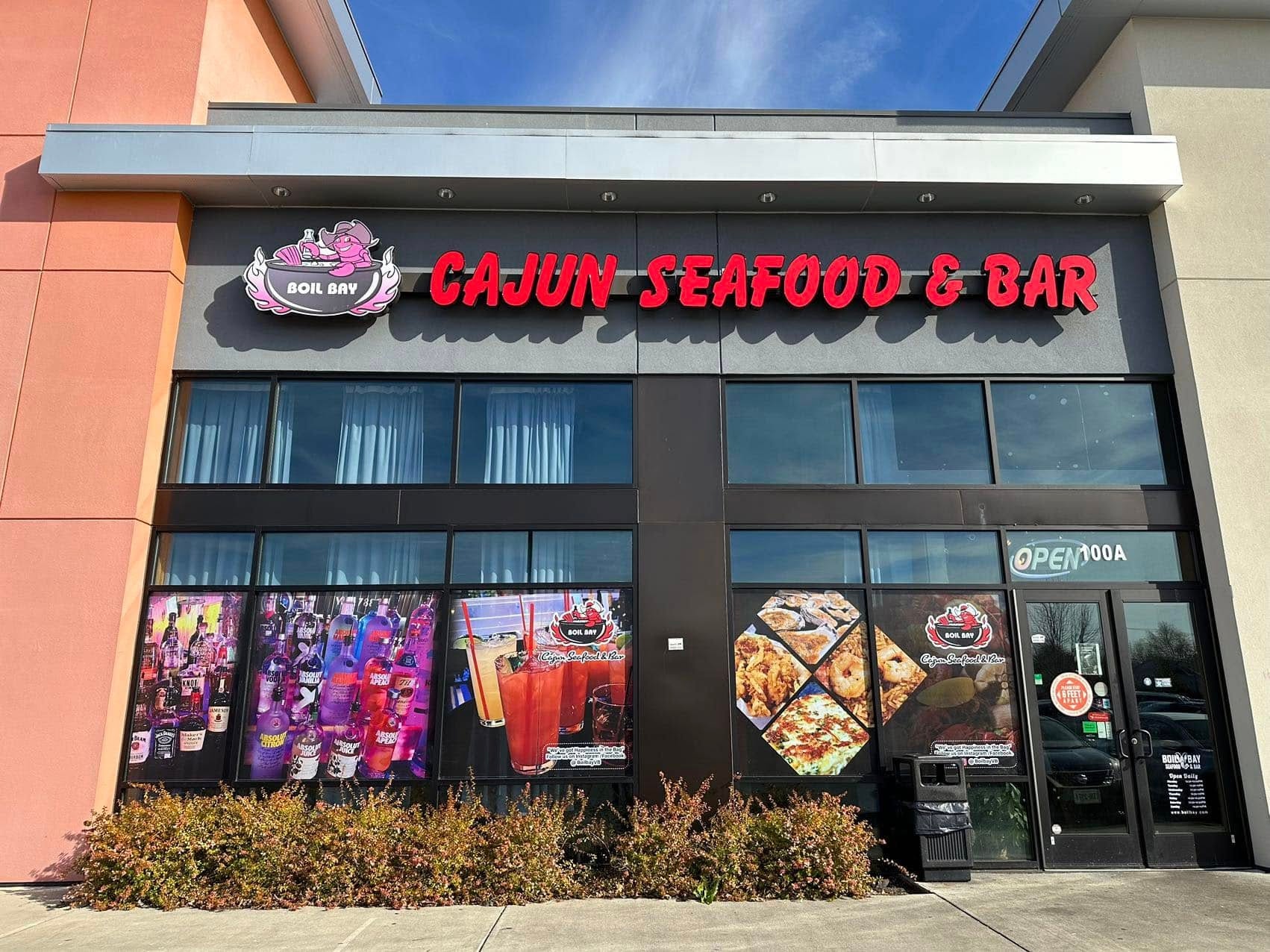 Fresh seafood display featuring red crabs and shrimp